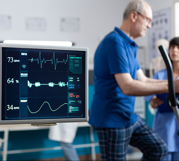 Specialist talking about cardiology or heart diagnosis with image of heart organ on tablet to a patient