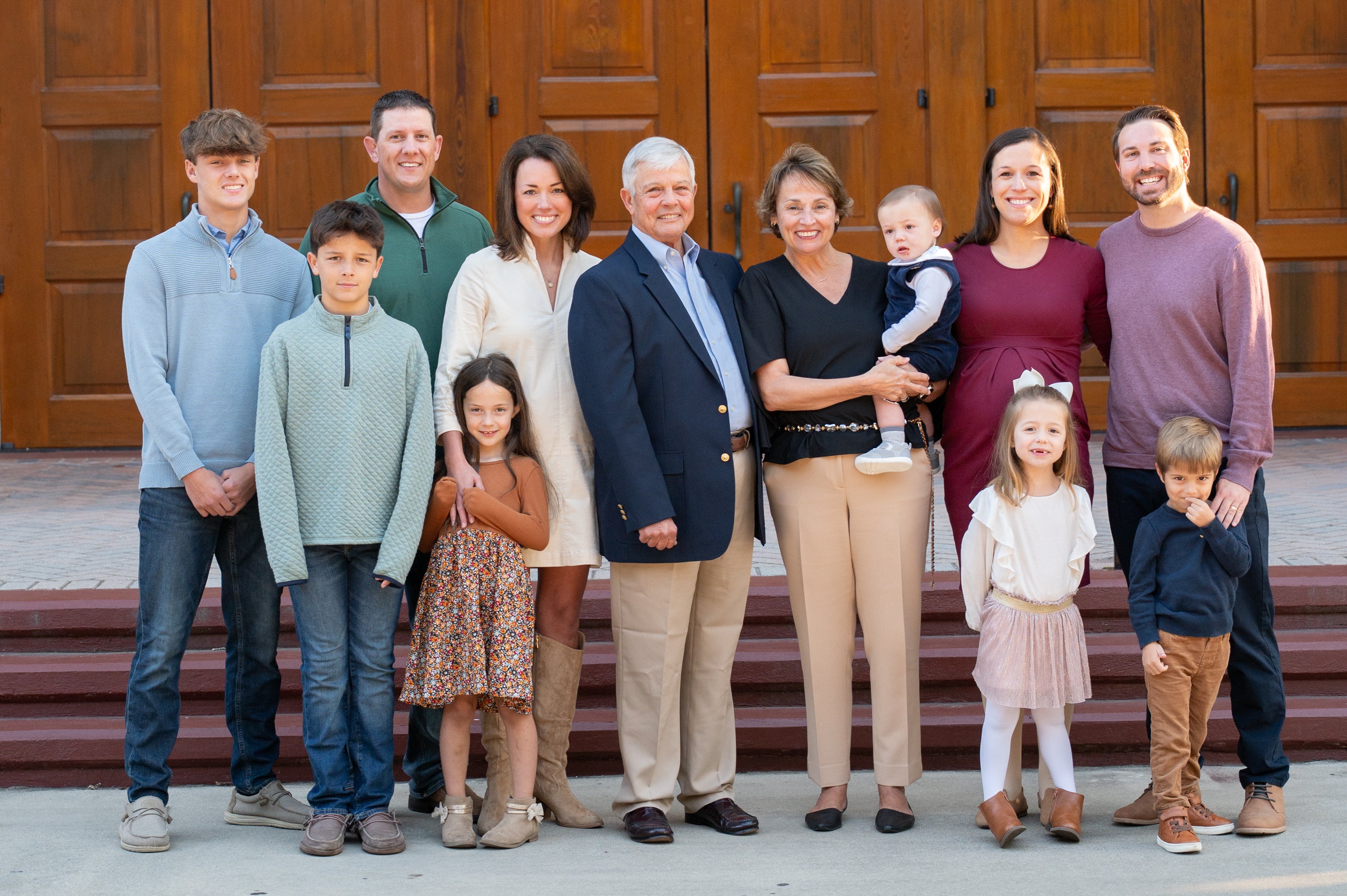 Karen Carroll stands amongst her family members for a casual photo shoot outside a Beaufort, South Carolina church