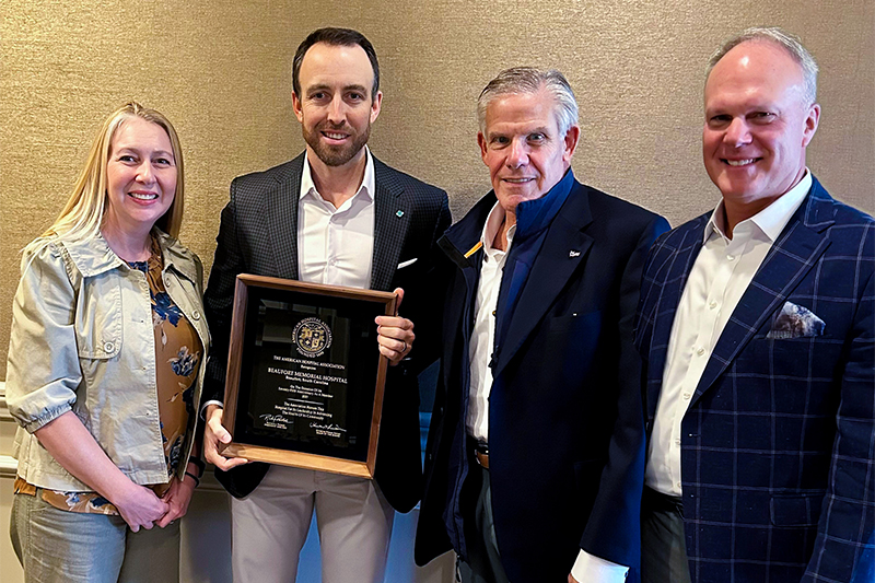 Russell Baxley, second from left stands with Rebecca Jolley, AHA Regional Executive, Region 4 (far left), Rick Pollack, AHA President & CEO and Thornton Kirby, South Carolina Hospital Association President & CEO (far right)