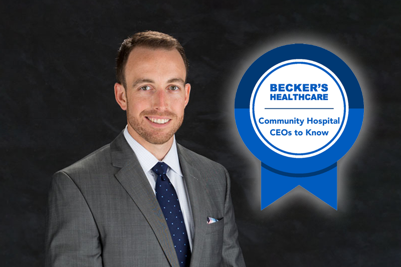 Professional headshot of Russell Baxley with an overlayed ribbon graphic for Becker's Healthcare Community Hospital CEOs to Know.