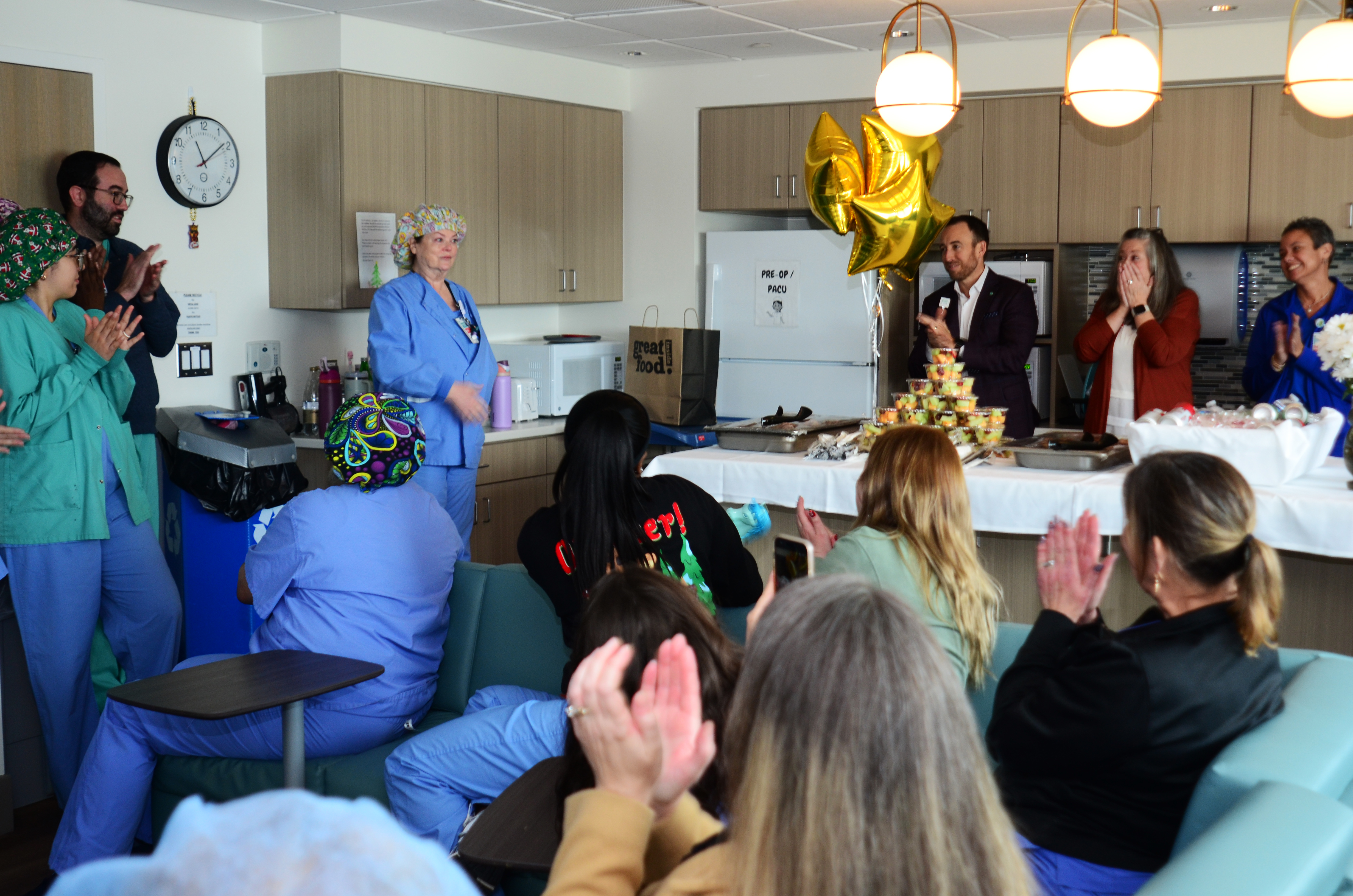 Denise Lindsey, Director of Perioperative Services, is surprised be colleagues and OR staff with a DAISY award