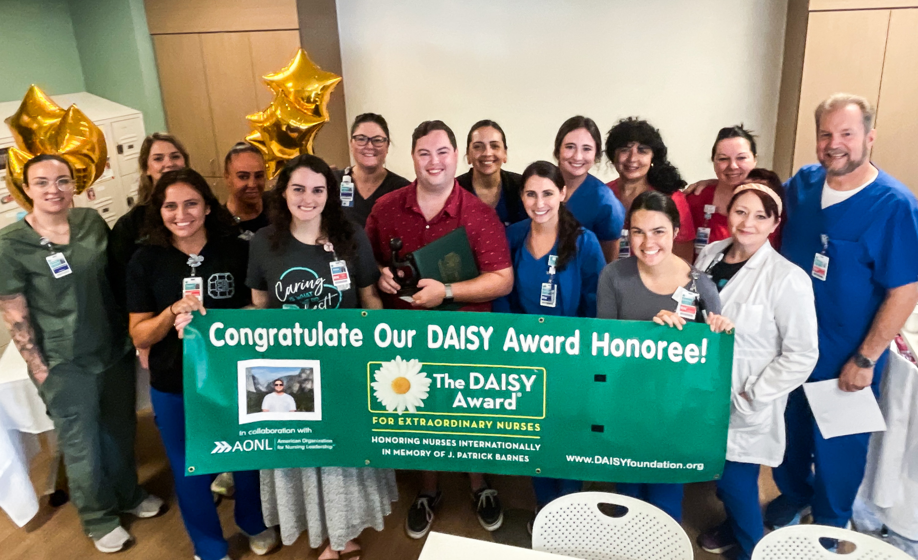A group photo of Beaufort Memorial staff with Jonathan Barrett to celebrate his DAISY Award