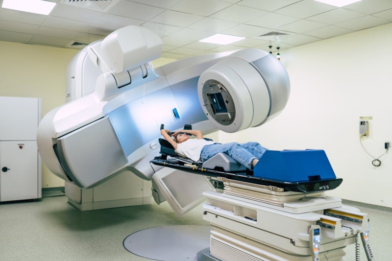 A radiation therapy treatment machine in a modern medical clinic.