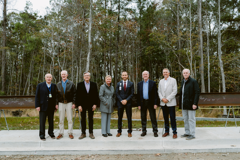 Russell Baxley, President and CEO of Beaufort Memorial Hospital, poses for a photo with South of Broad Healthcare and Beaufort Memorial Board of Trustees members at the topping-off ceremony for the Bluffton Community Hospital