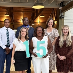 Group photo of the 15 service years honorees who attended the reception