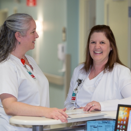 Beaufort Memorial nurses meet at nurses desk