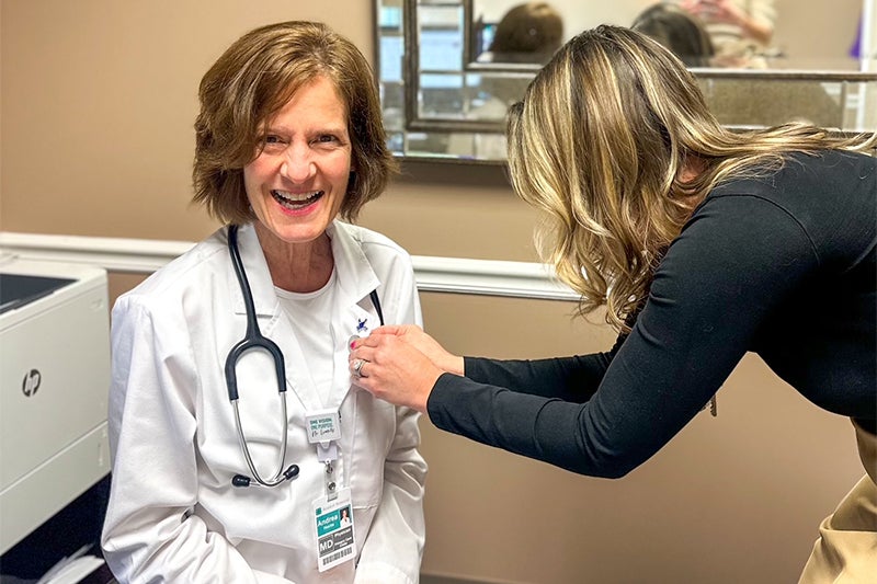 Dr. Andrea Hucks received an Honored Caregiver pin.
