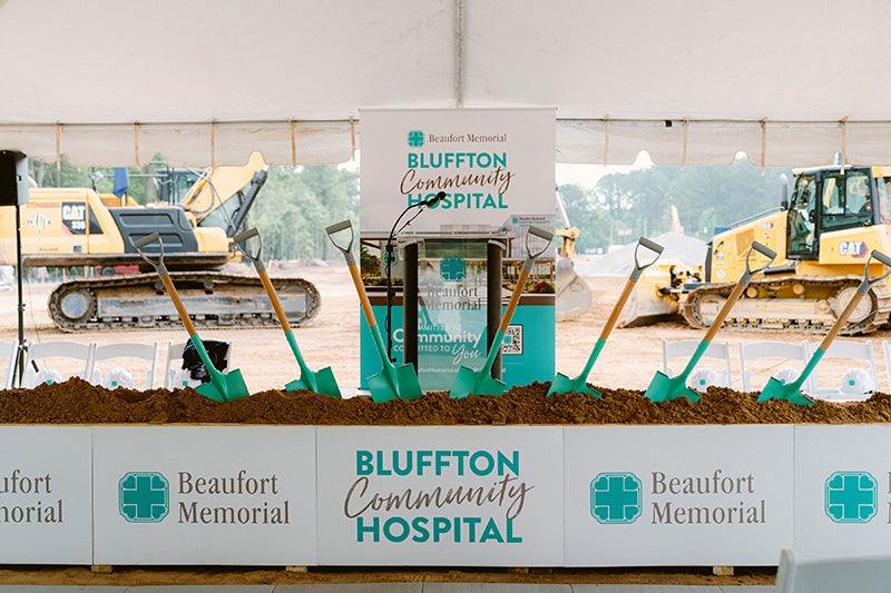 Shovels stand upright in a box of dirt at the groundbreaking ceremony of the Beaufort Memorial Bluffton Community Hospital.