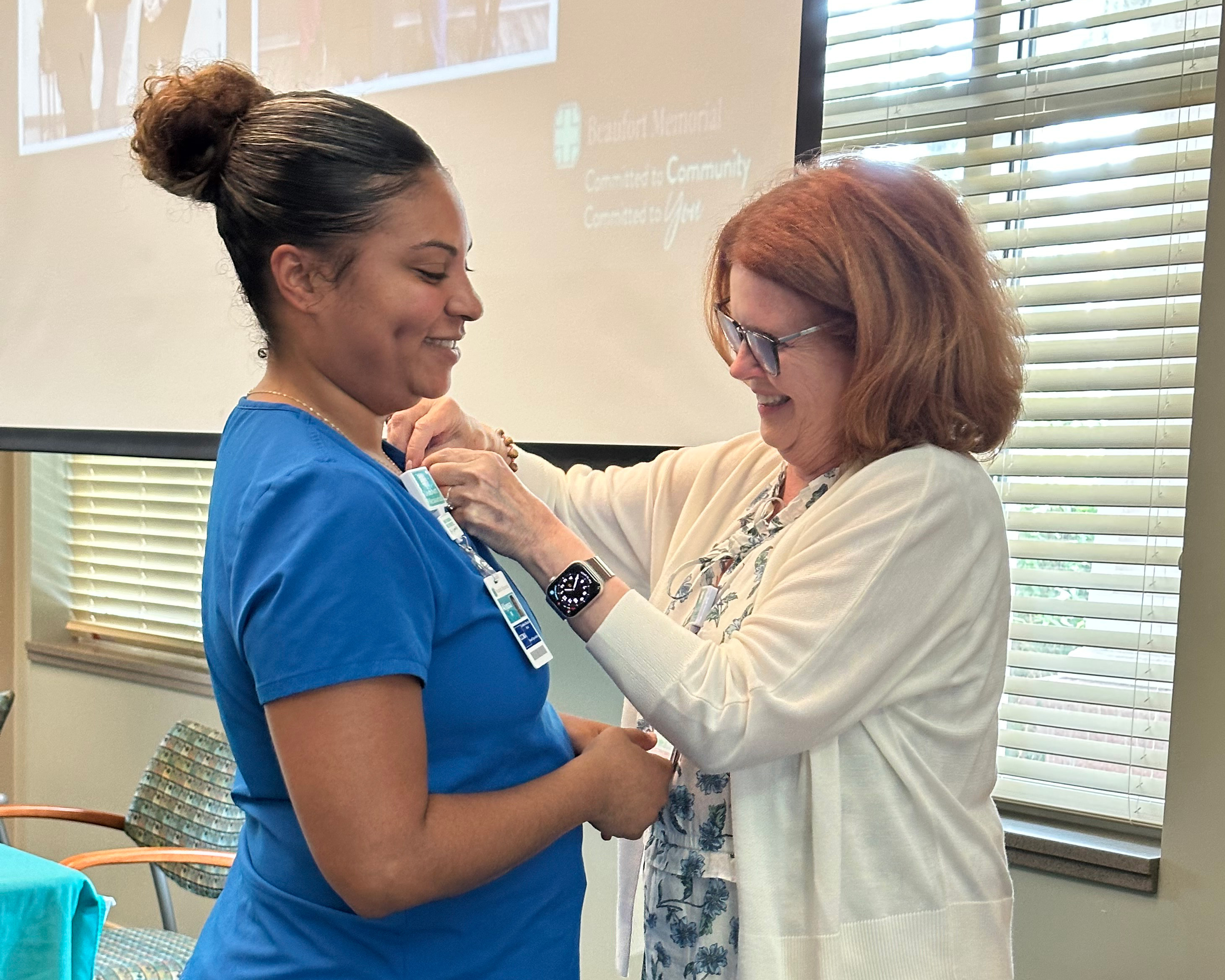 Alyssa Morgan gets pinned as a Certified Clinical Medical Assistant (CCMA)