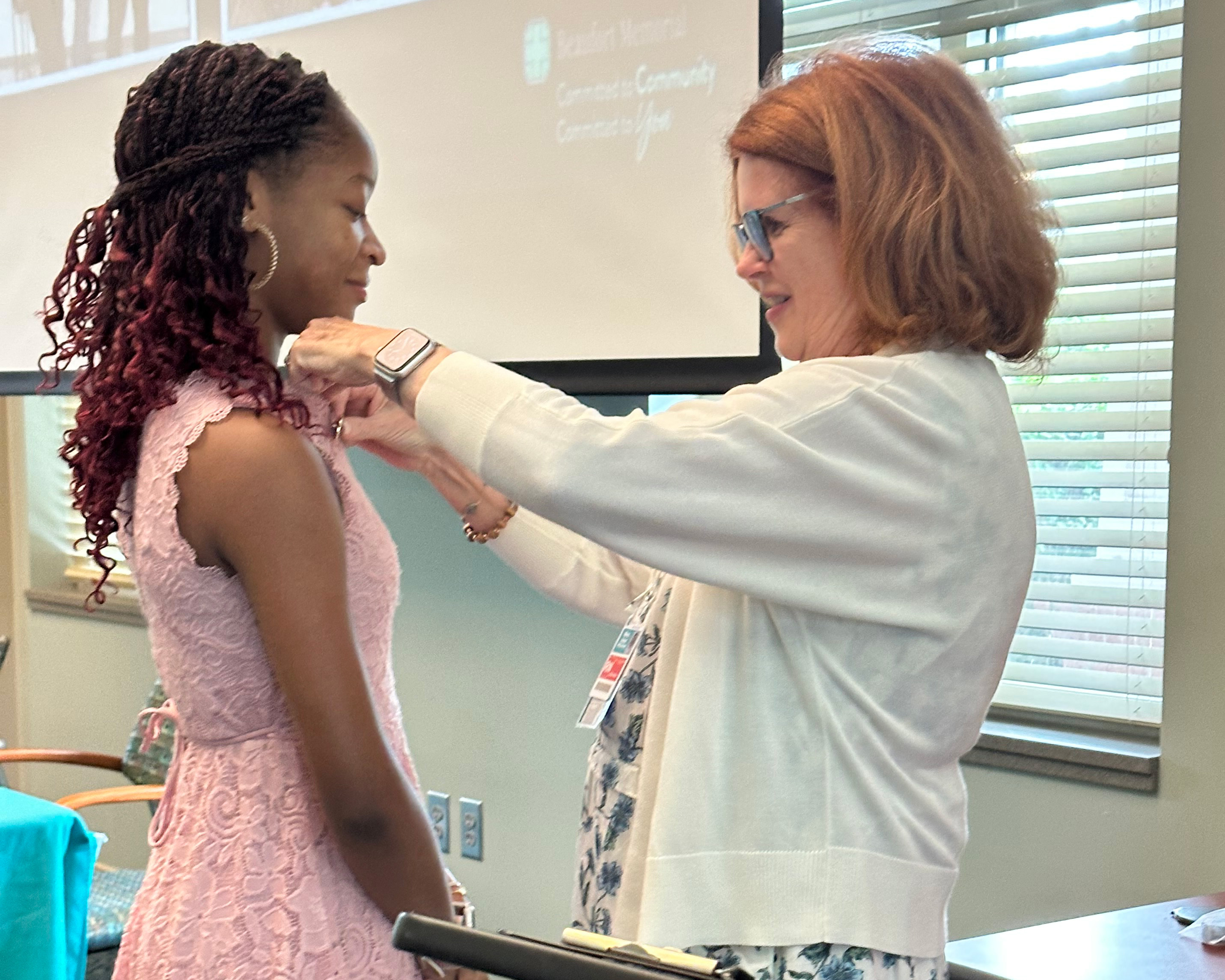Alani Crawford gets pinned as a Certified Patient Care Technician (CPCT)