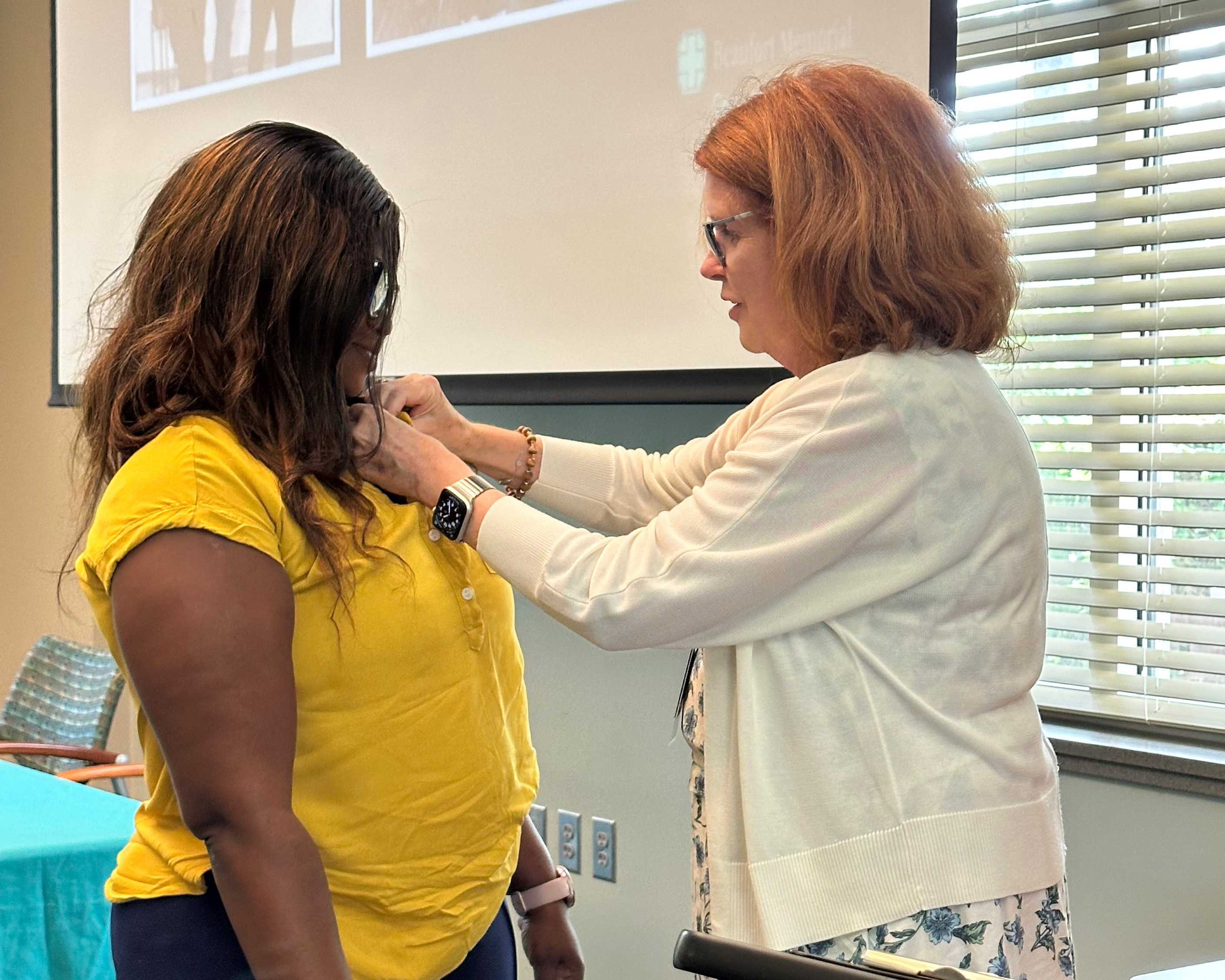 Tamara Thompson-Graham gets pinned as a Certified Patient Care Technician (CPCT)