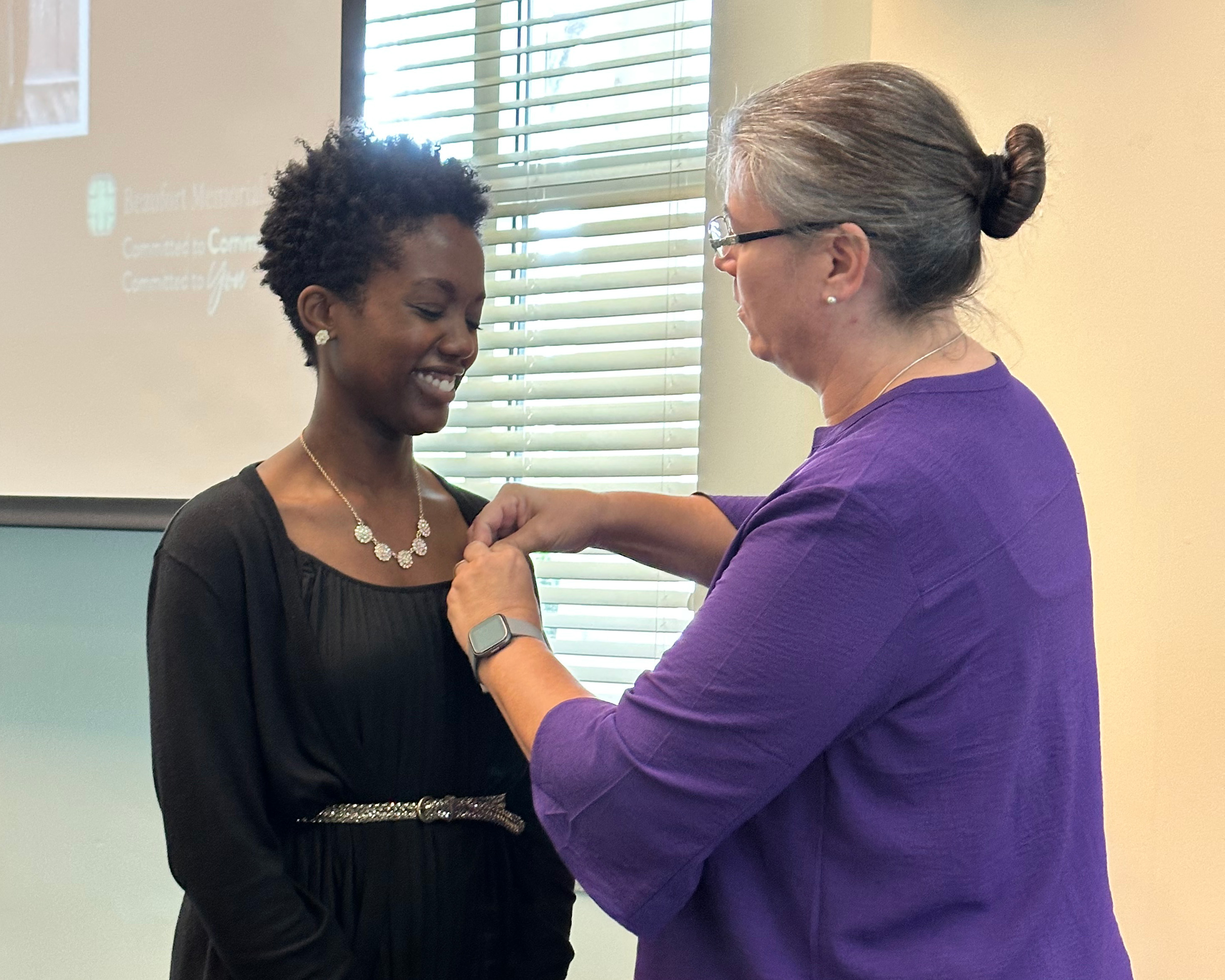 Sarah Europe gets pinned as a Certified Professional Coder (CPC)