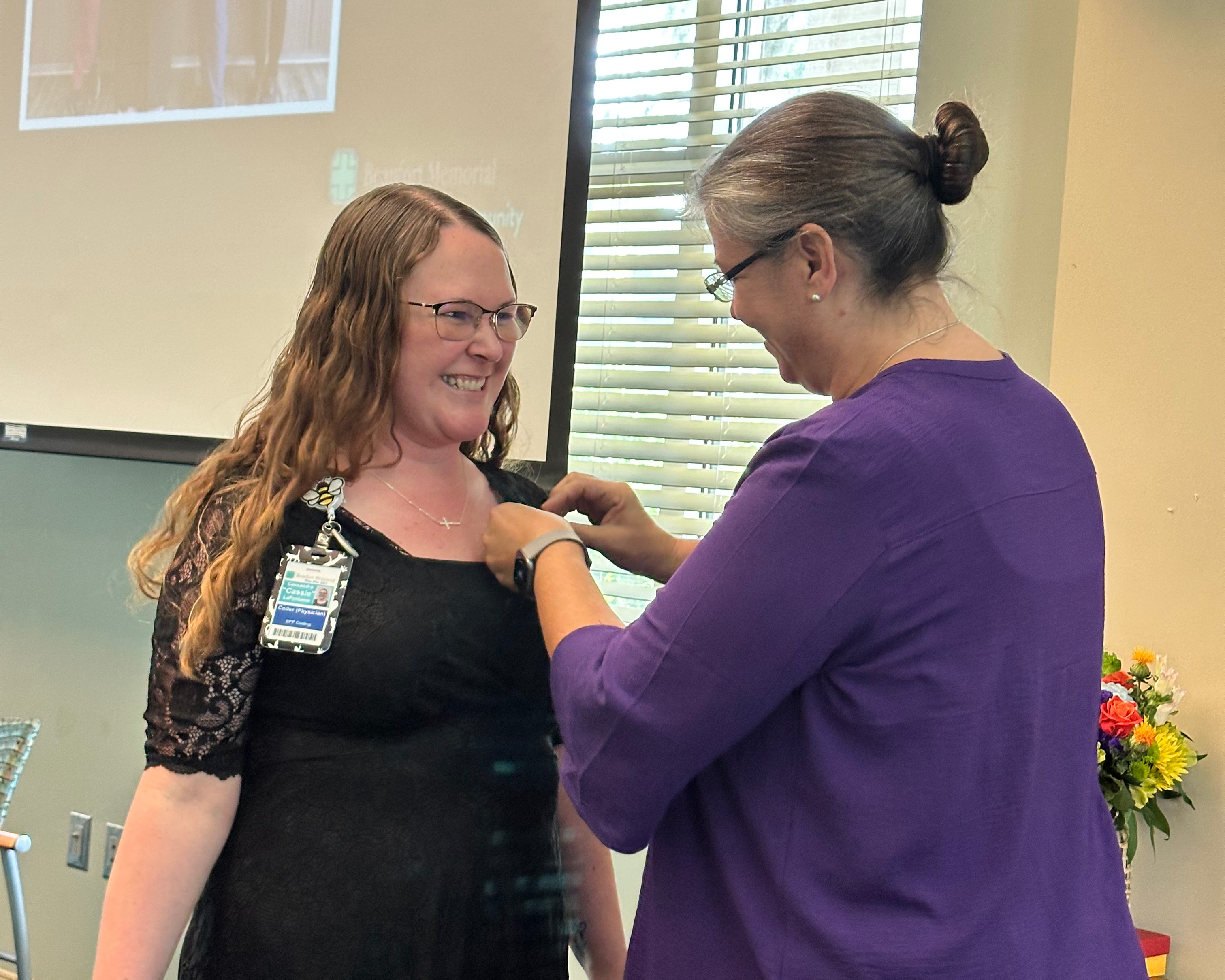 Cassandra "Cassie" LaFontaine gets pinned as a Certified Professional Coder (CPC)