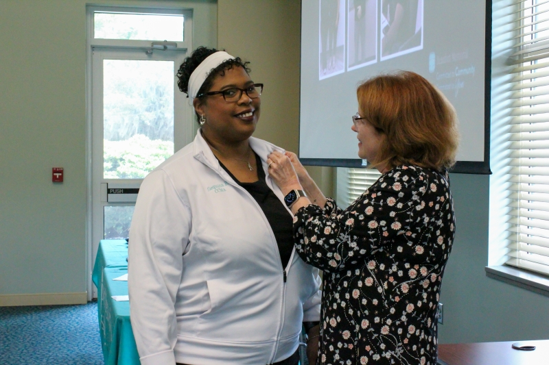 Sequina Register, CCMA gets her pin for earning national certification as a Certified Clinical Medical Assistant 