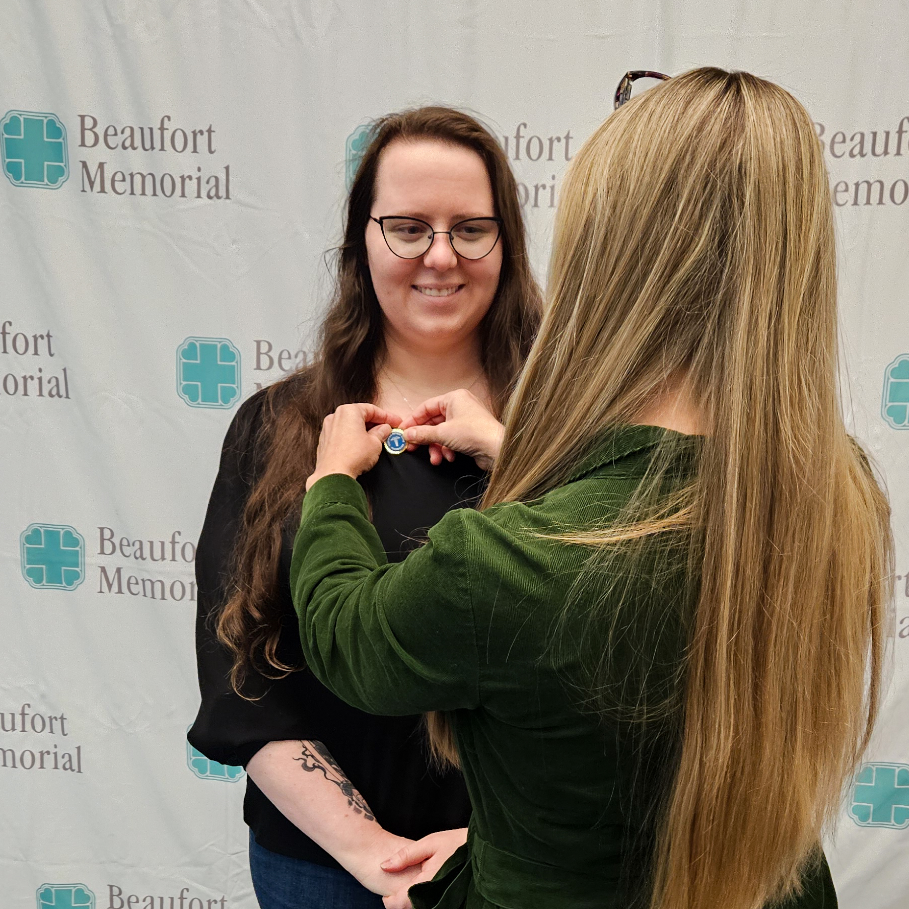 Ashley Sgro-Chiang receives her national Patient Care Technician pin