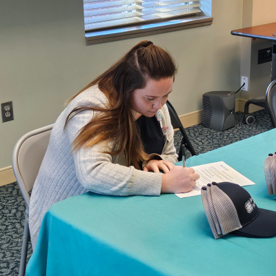 Cherokee Welch signs a letter of intent for the Patient Care Technician pathway for cohort 12