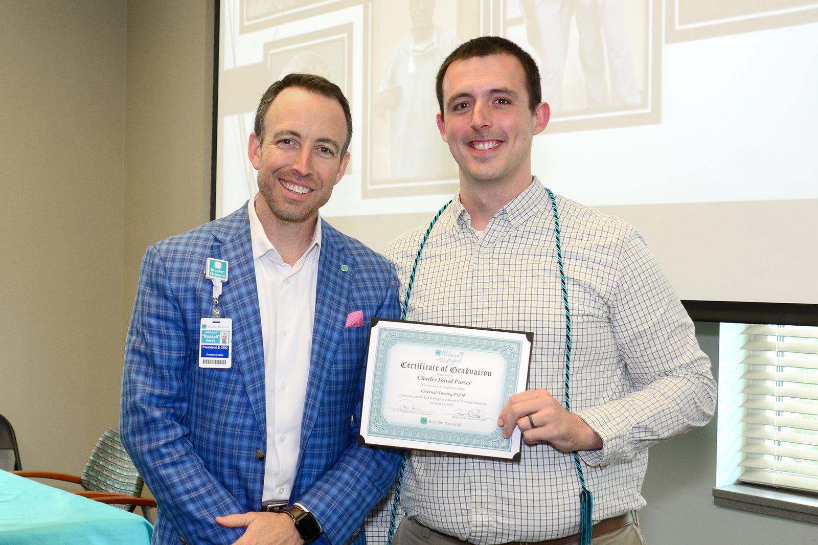 Russell Baxley and David Purser pose for a photo at the Beaufort Memorial PATH Cohort 12 Graduation on April 22, 2026.