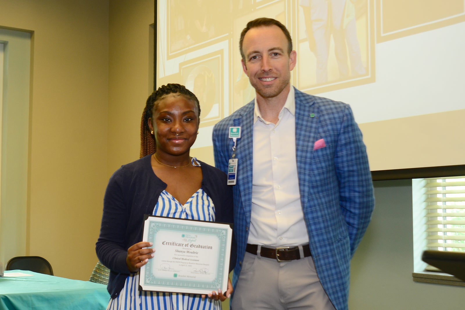 Shanya Moultrie, CMA and Russell Baxley.