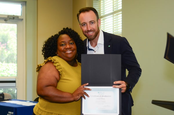 Crystal Wilson, Patient Care Technician, and Russell Baxley at PATH Cohort 13 Graduation
