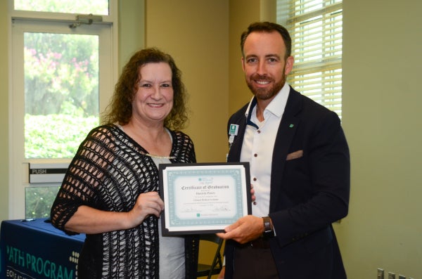 Daniela Peters, Clinical Medical Assistant, and Russell Baxley at PATH Cohort 13 Graduation