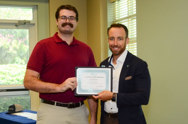 Gabriel Bryant, Surgical Technician, and Russell Baxley at PATH Cohort 13 Graduation