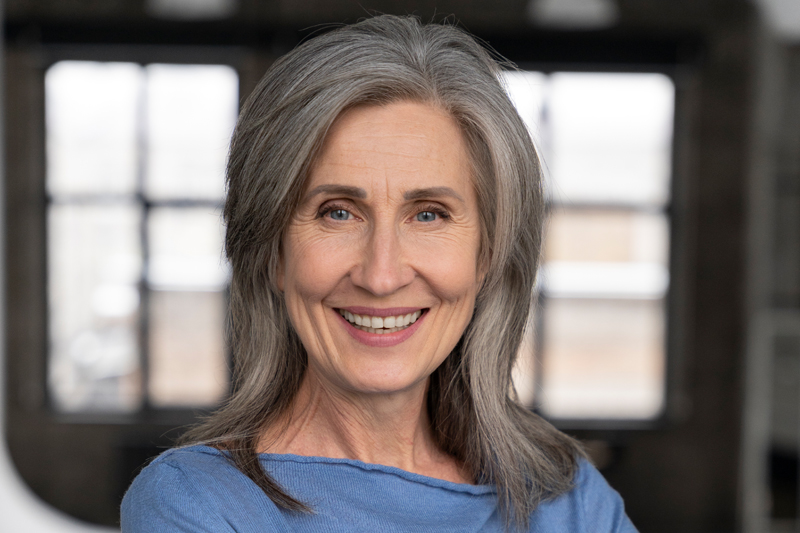 Aging woman smiling at camera