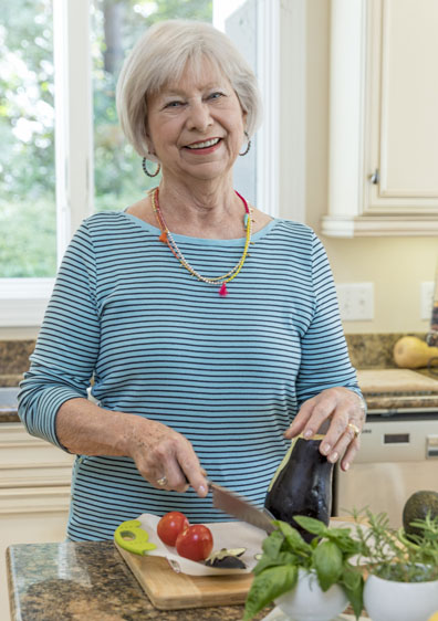 chopping an eggplant
