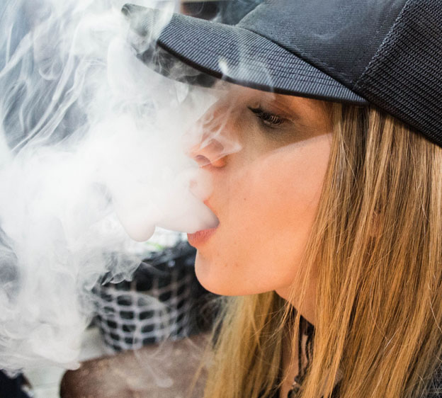 young woman vaping