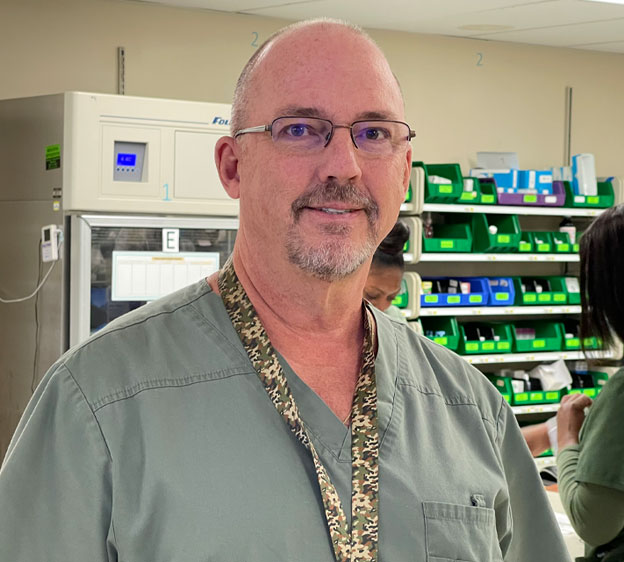 Tim McCall, director of pharmacy services at Beaufort Memorial, stands in the hospital's pharmacy.