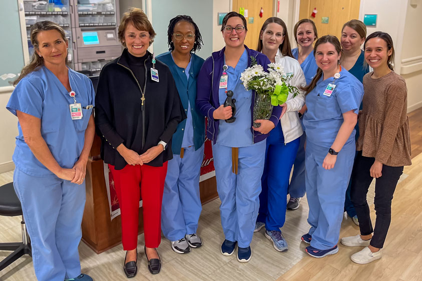 Andrea Farr poses with group of nurses.