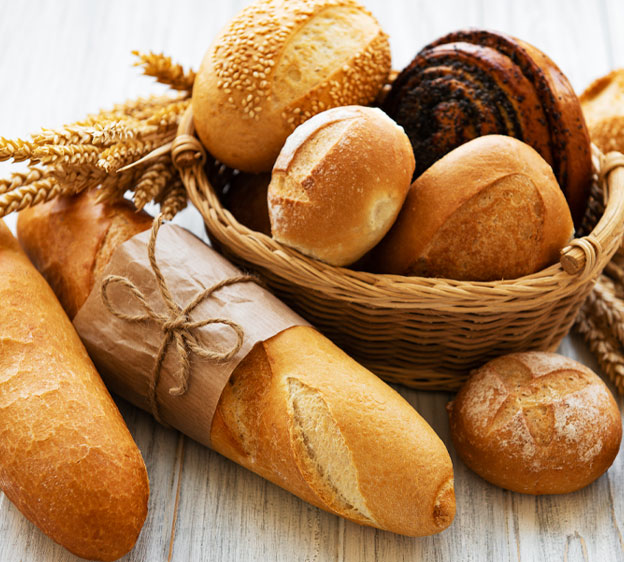 Bread basket filled with loaves and rolls