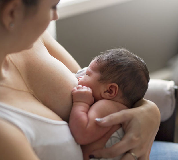 mother breastfeeding her baby