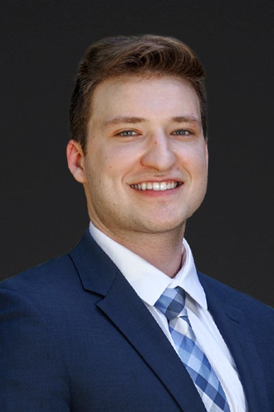 Professional headshot of Devin Dukes, PA-C