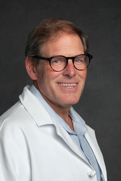 Professional headshot of John P. Krcmarik, M.D., FCCP